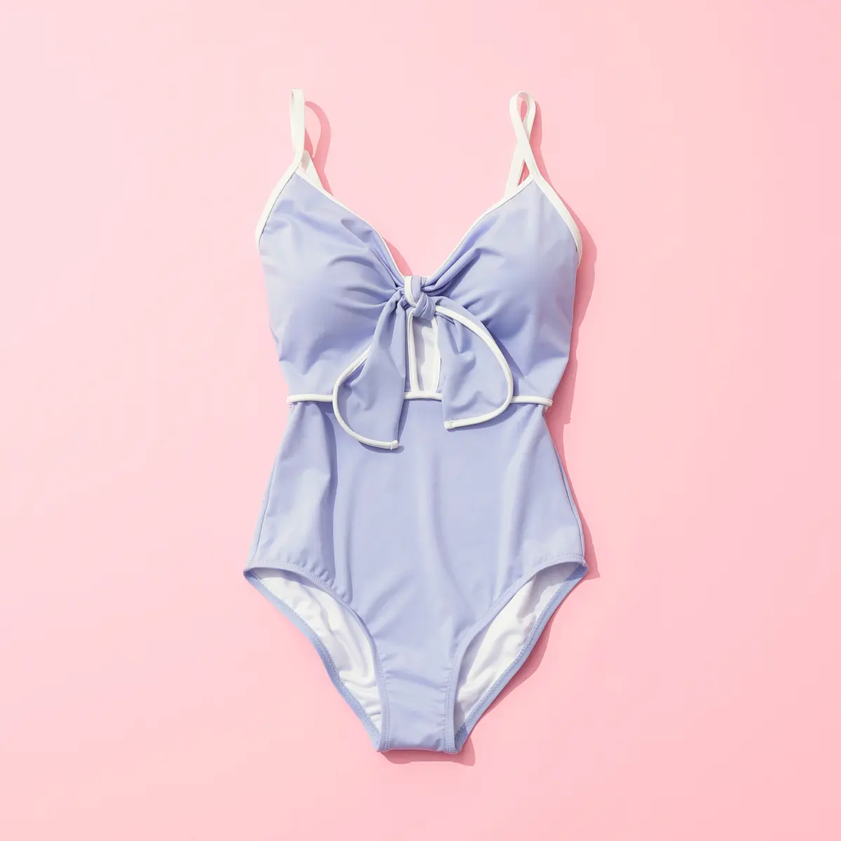 「AGNEL（アグネル）」のフロントリボンオープンカットワンピース水着