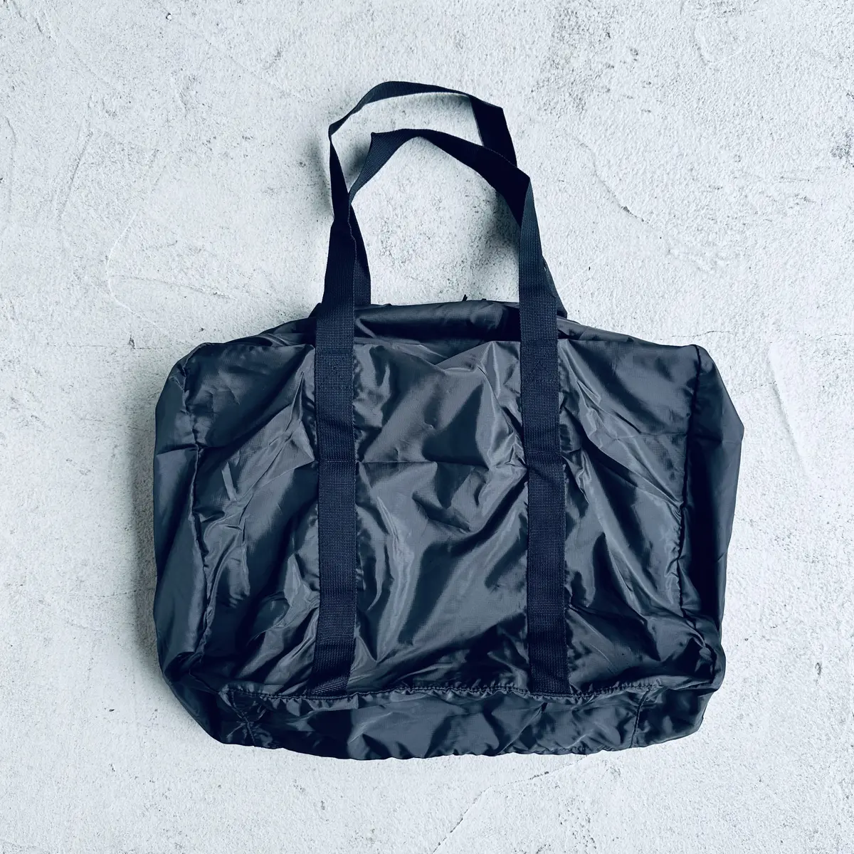 たためる 撥水 旅に便利なボストンバッグ（75L用）￥4490／良品計画（無印良品）