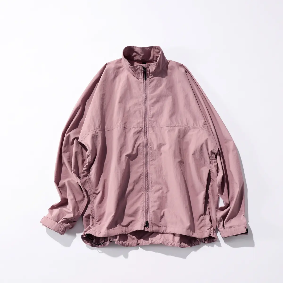 くすみピンクのジャケット